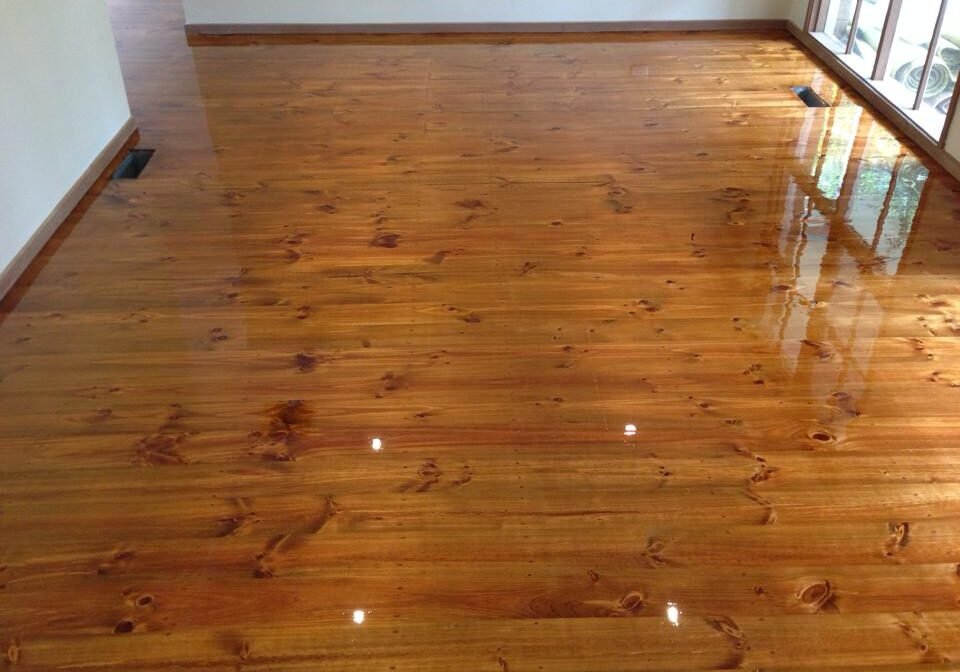 Timber floorboards sanded and coated to a gloss finish in Auckland