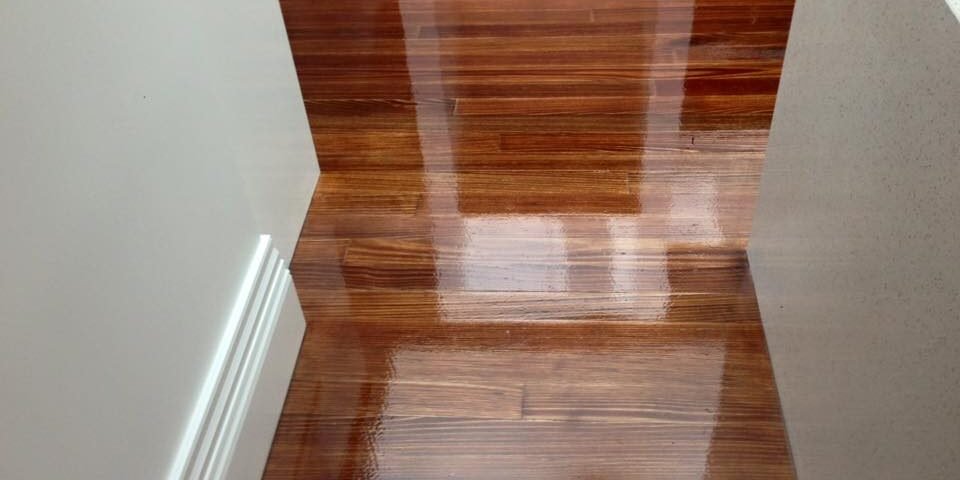 Stained timber floorboards after sanding