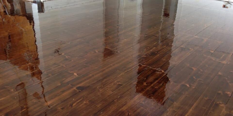 Glossy timber floor after sanding and three coats, Auckland